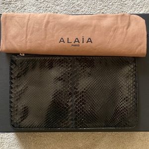 Beautiful Alaïa black python clutch